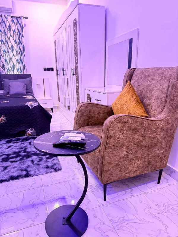 Armchair beside the wardrobe